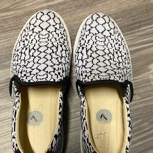 Skechers Black and White Slip-On Shoes